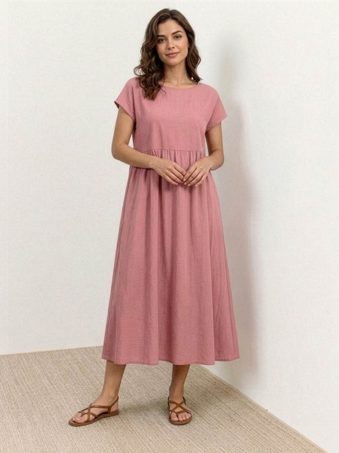 Elegant capped-sleeve voluminous pleated midi dress with flowy skirt and pockets