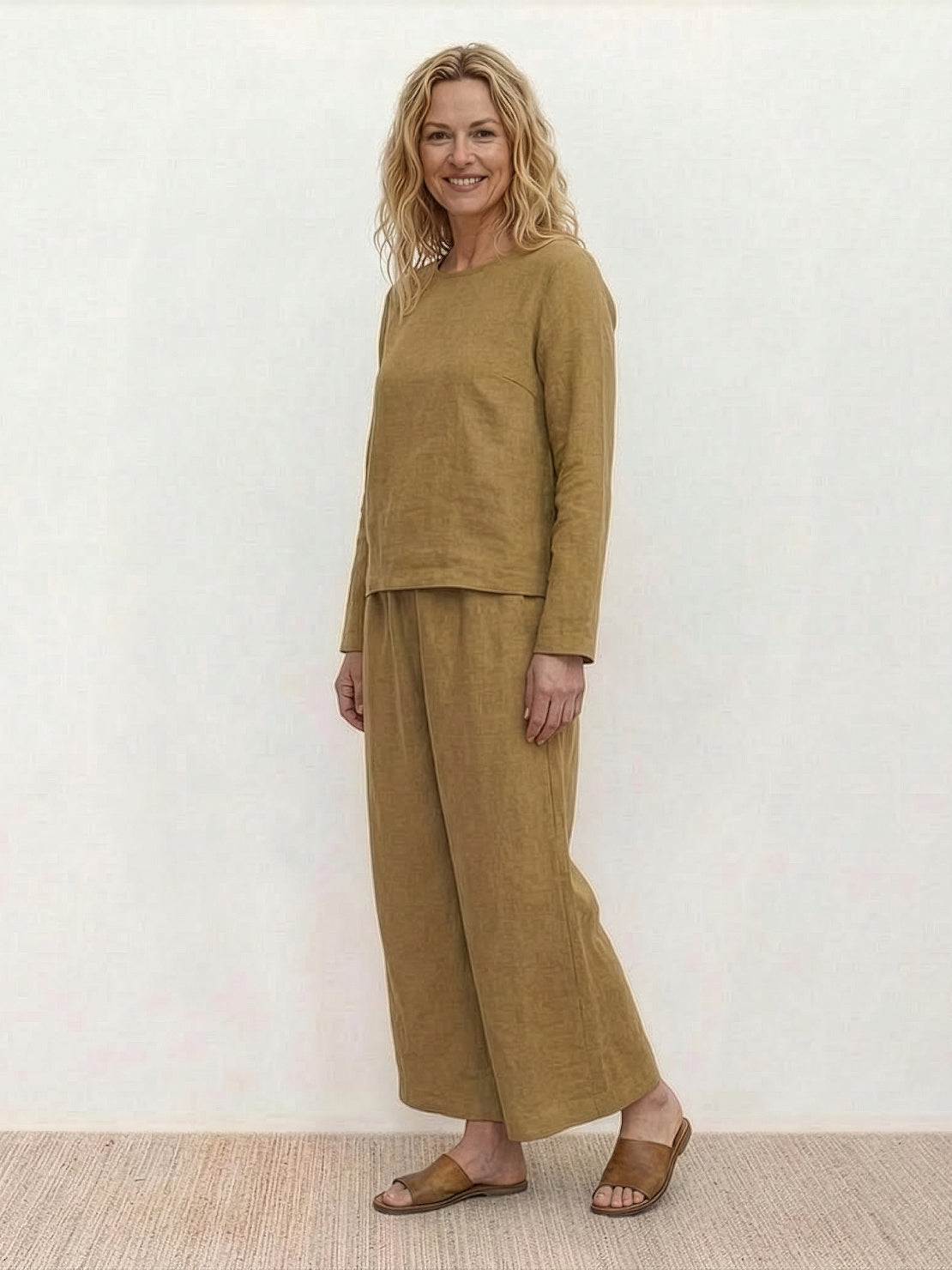 Loose solid color two-piece set with breathable, soft fabric and relaxed fit for everyday comfort and style