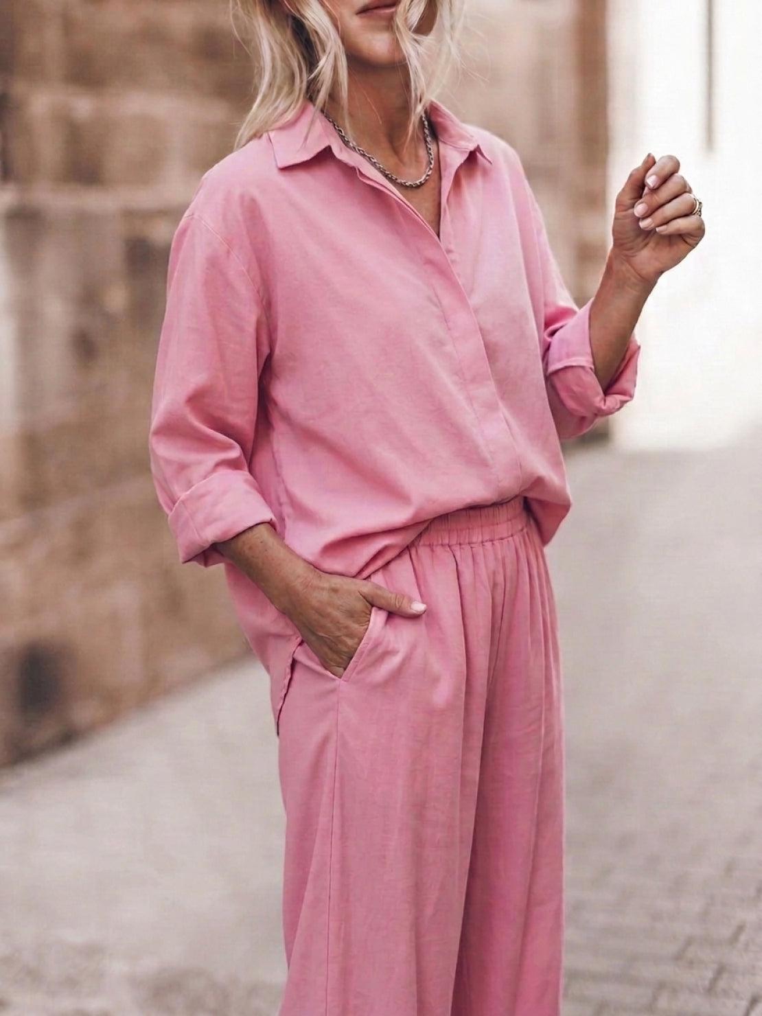 Woman wearing oversized 100% cotton shirt and wide-leg pants co-ord set in relaxed style