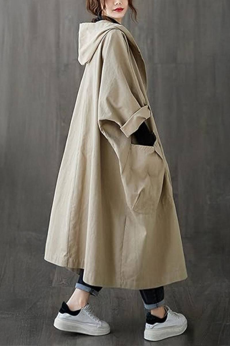 Oversized beige water resistant windbreaker jacket with hood and large front pockets