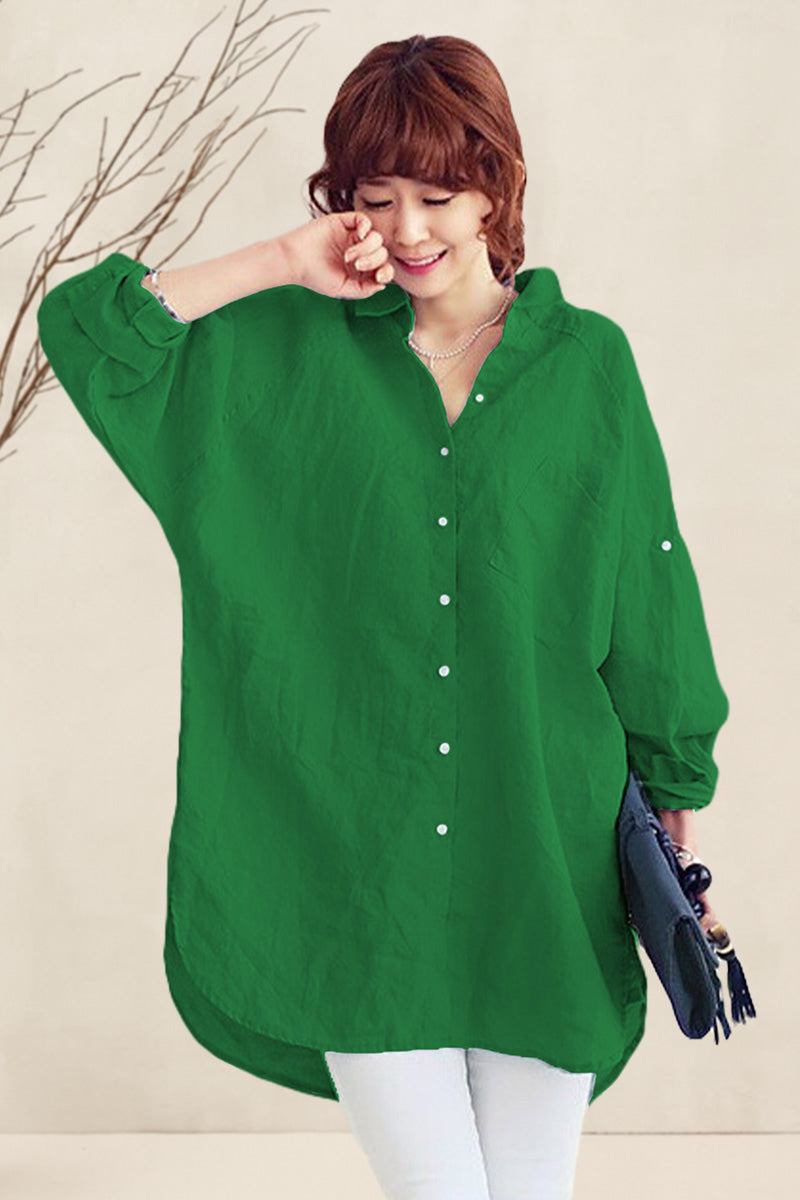 Woman wearing oversized green linen shirt with relaxed fit and button-up front