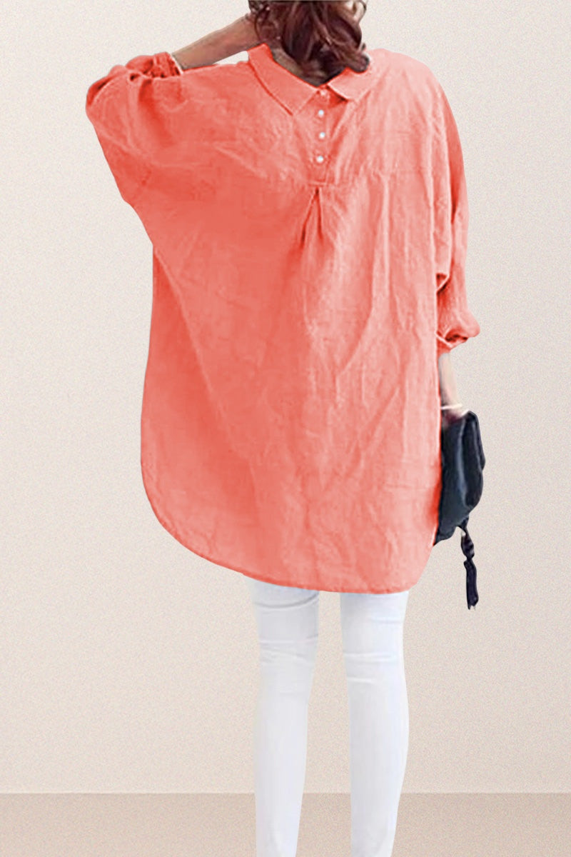 Back view of oversized linen shirt in sun-washed pink with button details and loose fit