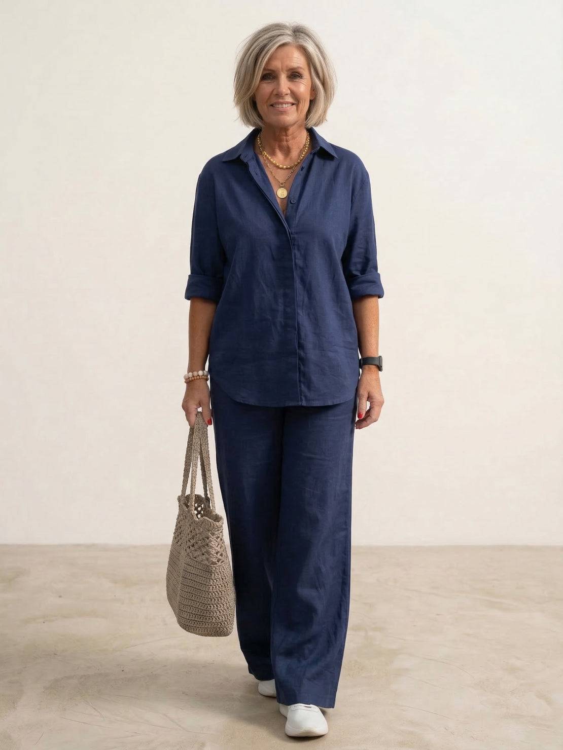 Woman wearing oversized 100% cotton shirt and wide-leg pants co-ord set