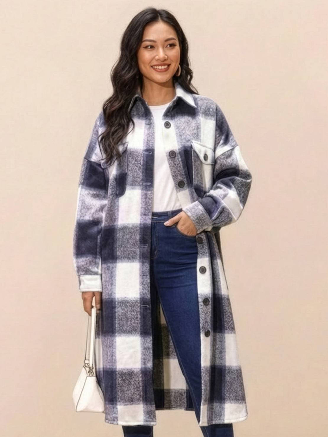 Oversized medium-length blue plaid wool-blend overshirt with relaxed fit and functional pockets