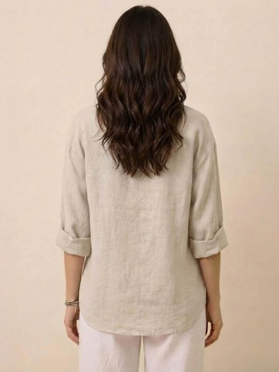 Pure linen age-defying shirt with button detail, breathable and soft fabric for a cool, elegant look