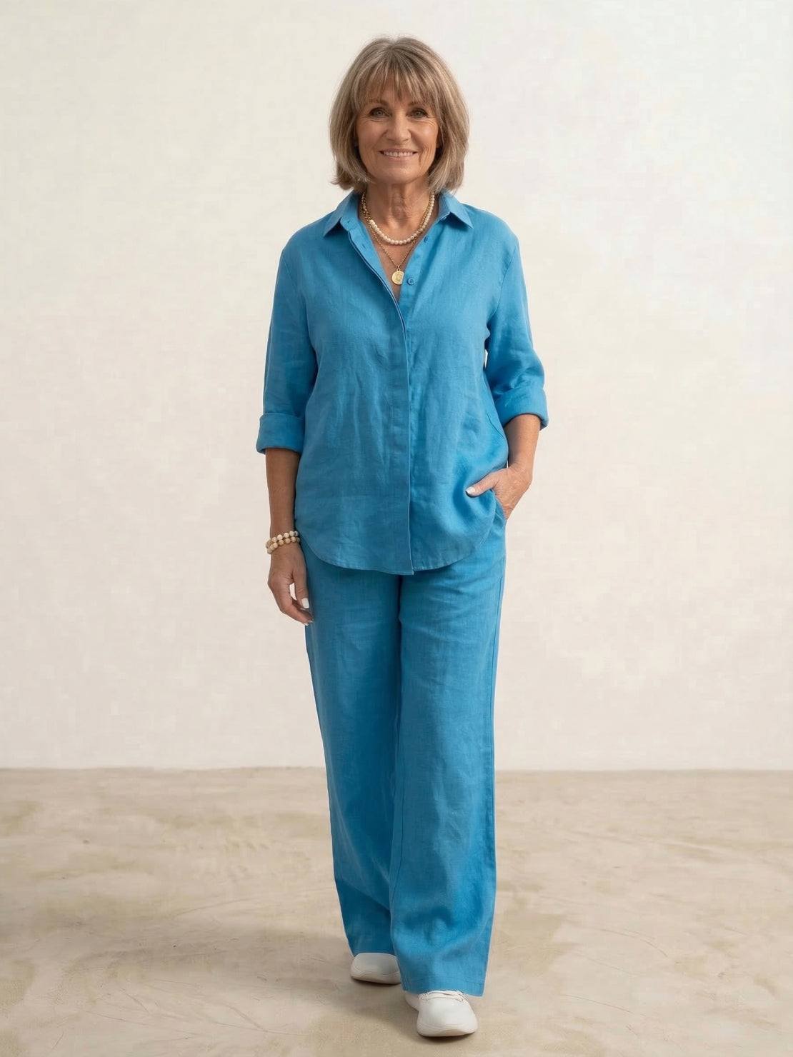 Woman wearing a relaxed shirt and trousers two-piece set in monochrome, styled casually and comfortably for everyday wear