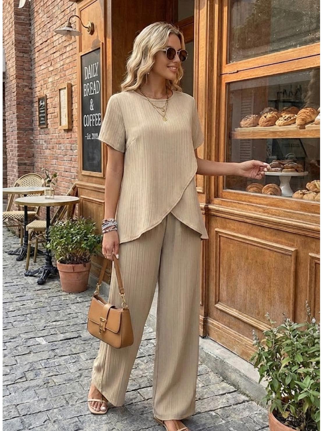 Women's Textured Elegance two-piece set with asymmetrical top and wide-leg pants in soft stretch fabric