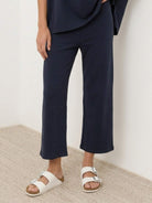 Cotton-blend capelet lounge set with mock neck top and wide-leg pants in smooth fabric