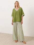Black striped wide-leg co-ord set with oversized top and palazzo pants
