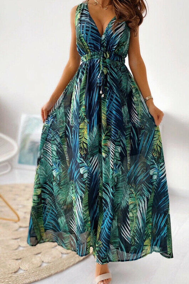 Casual sleeveless dress with blue and green tropical leaf print, lightweight and flowy summer gown.