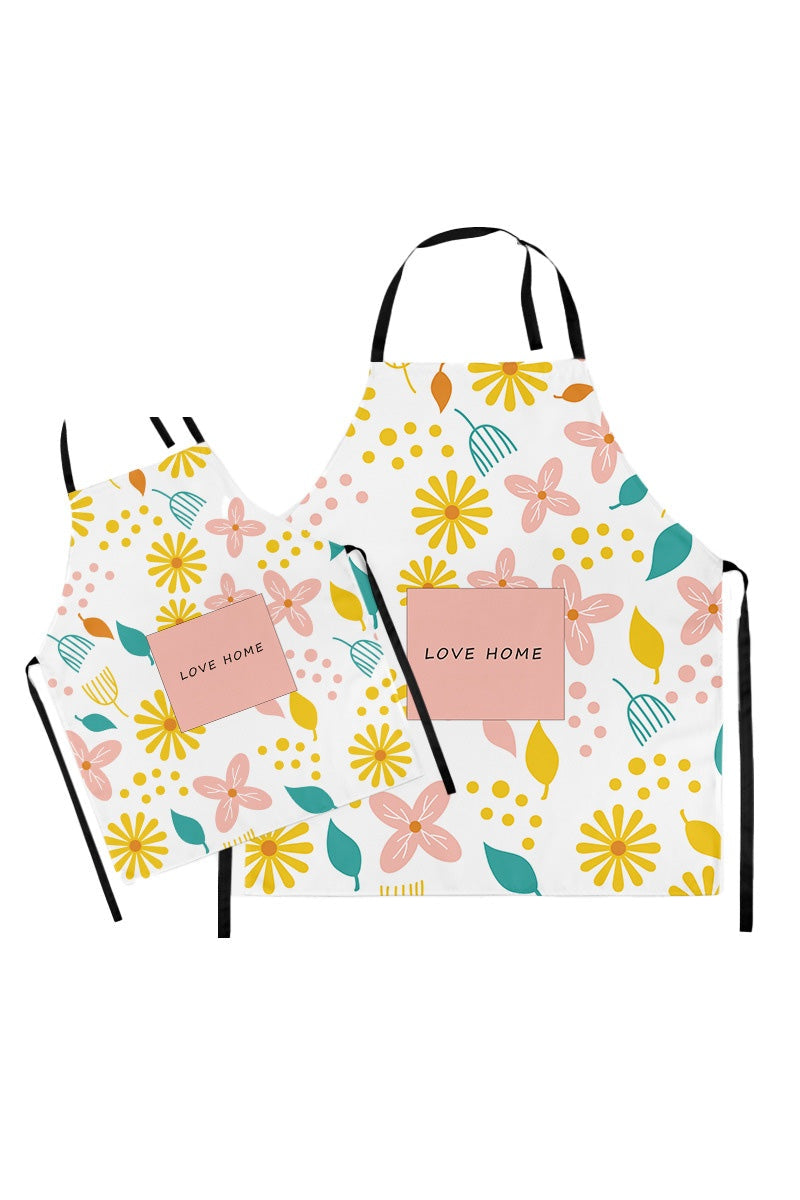 Mommy & Me Apron Set with colorful floral pattern and "Love Home" text, matching parent-child kitchen aprons.