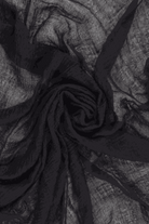 Lightweight black linen Color-POP Scarf with breathable, eco-friendly fabric, ideal for all weather conditions.