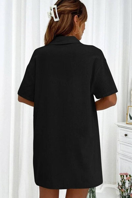 Woman wearing black Sunny Day Vibrance two-piece set shirt viewed from the back