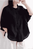 Relaxed loose breathable black linen blouse with button-down front and wide sleeves for comfortable summer wear