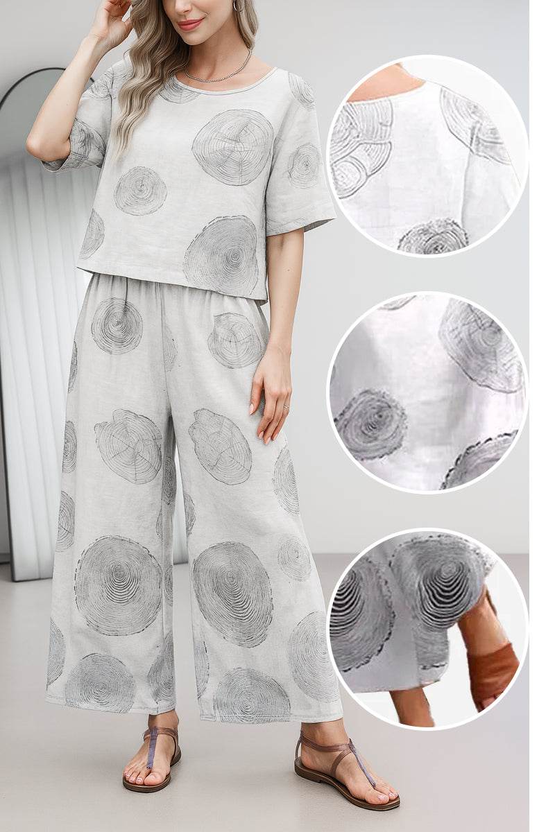 Loose fit co-ord set with wide-leg pants and short sleeve top in light fabric with circular print pattern