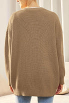 Relaxed fit oversized knitwear cardigan in beige shown from the back
