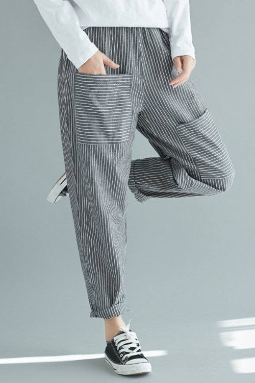 High waist striped casual comfort pants with pockets and rolled cuffs in black and white polyester blend