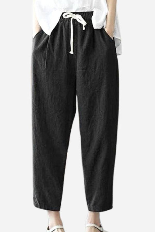 Black relaxed fit straight pants with drawstring waist and casual style