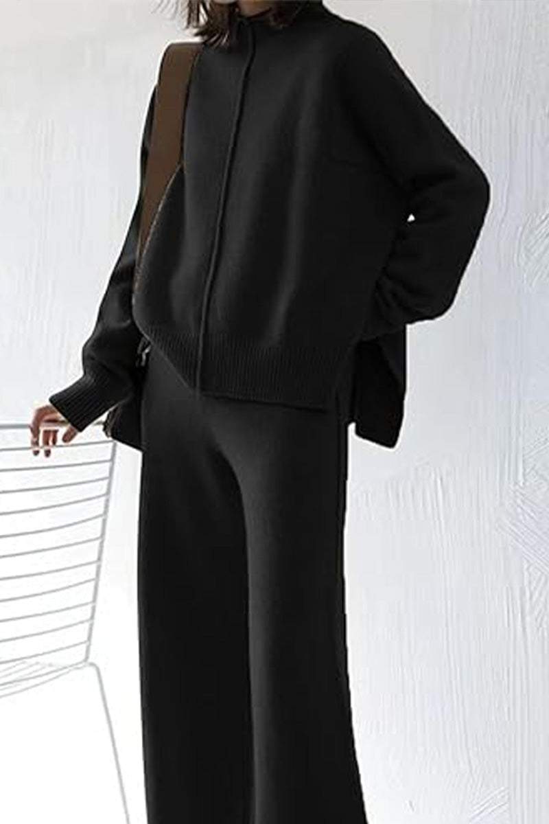 Black high neck sweater and wide leg pant set with relaxed fit and center seam detail