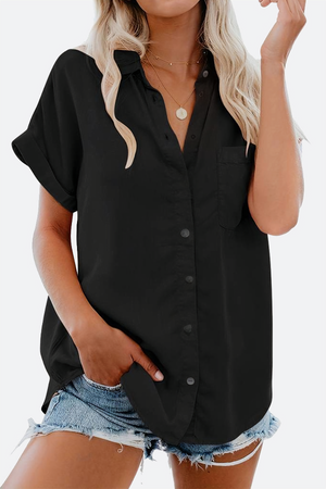 Black V-neck collared button blouse with rolled short sleeves and front pocket, styled with denim shorts.