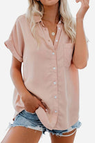 Womens V-neck collared button blouse in soft pink with rolled short sleeves and front pocket
