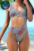 Seamless anti-tan line one-piece swimsuit with cutouts and coral print on beach background