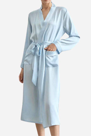 Light blue Mulberry silk nightgown with long sleeves, sash belt, and front pockets in relaxed fit