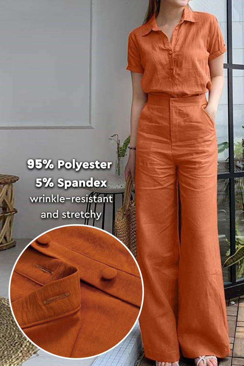 Woman wearing rust-colored linen-look set with short-sleeve collared shirt and wide-leg pants, made of 95% polyester and 5% spandex, wrinkle-resistant and stretchy fabric.