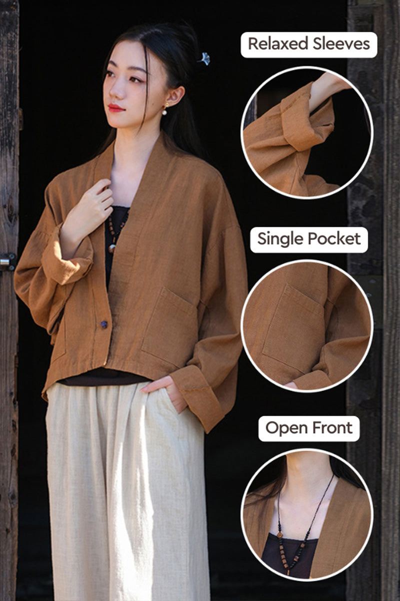 Woman wearing a brown ramie linen and cotton cardigan with relaxed sleeves, single pocket, and open front design.