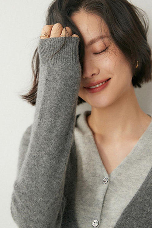 woman wearing gray single-breasted cashmere wool cardigan with relaxed fit