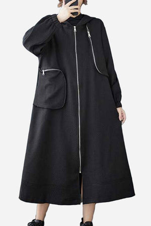 Black ZipLine oversized long coat with A-line silhouette and zippered pockets, lightweight waffle-textured fabric, one size fits all.