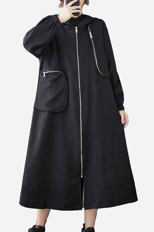 Black ZipLine oversized long coat with A-line silhouette and zippered pockets, lightweight waffle-textured fabric, one size fits all.