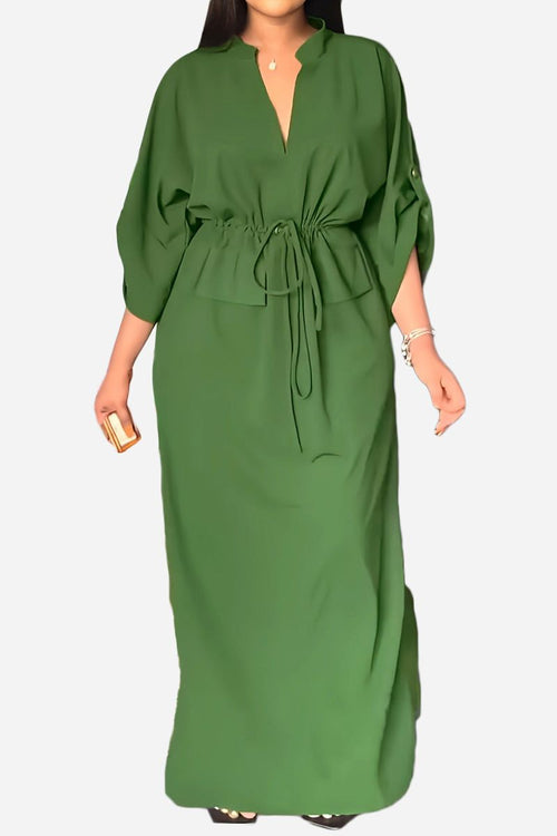Green All-Day Drape Dress with adjustable waist tie and front slit, breathable polyester fabric.