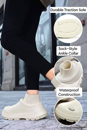 Fleece-lined comfort clogs with waterproof construction, sock-style ankle collar, and durable traction sole for all-weather wear