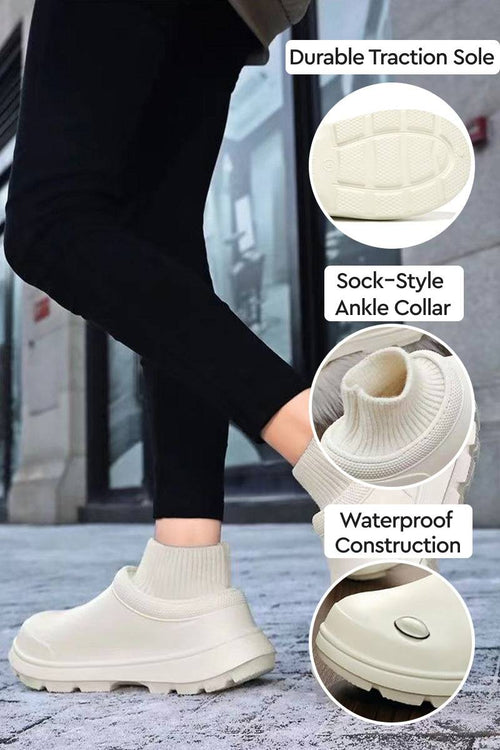 Fleece-lined comfort clogs with waterproof construction, sock-style ankle collar, and durable traction sole for all-weather wear