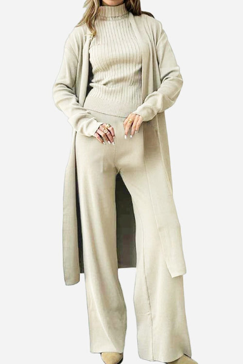 Beige one-size-fits-all luxurious three-piece collection with cardigan, ribbed turtleneck, and wide-leg pants