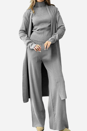 Elegant grey three-piece collection with ribbed turtleneck, wide-leg pants, and long cardigan, one size fits all