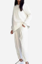 Woman wearing white All-Day Comfort 2-Piece Outfit Set with relaxed fit top and pants