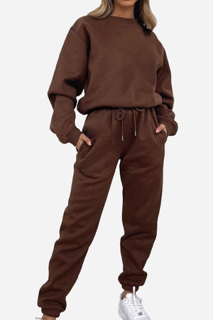 Classic Comfort Athleisure set in brown with relaxed fit sweatshirt and jogger pants, made from stretchy polyester-spandex blend.