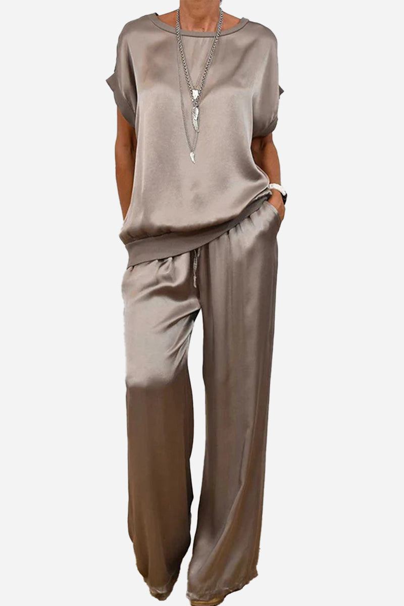 Silken Escape satin two-piece set in taupe with relaxed fit top and wide-leg pants.