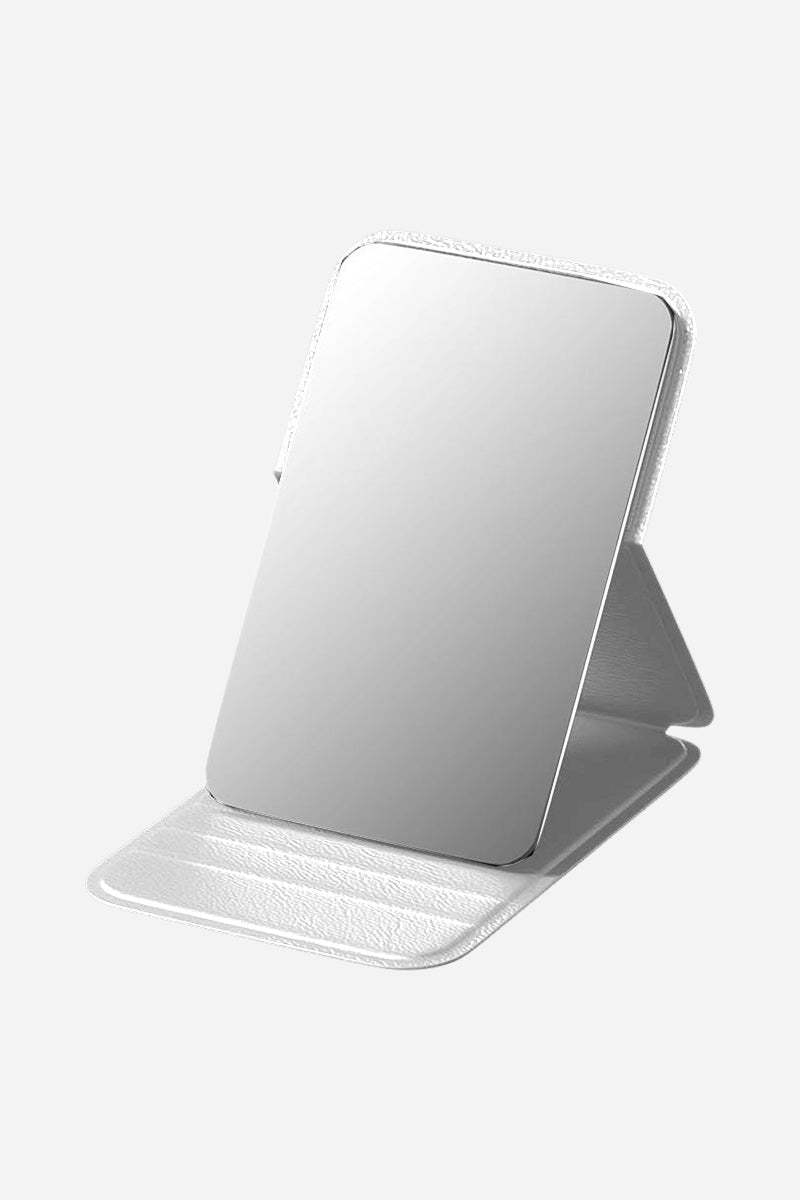 Compact travel pocket mirror with durable white PU leather case and clear reflective surface.