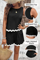 Flattering Coastal Scallop two-piece sleeveless black top and high-waisted shorts set with scalloped hem beachwear