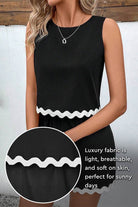 Flattering Coastal Scallop two-piece set in black with scalloped hem, made from light, breathable viscose fabric for comfortable, chic wear.