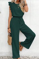 Elegant two-piece set with lace detail in dark green, featuring a sleeveless top and wide-leg pants.