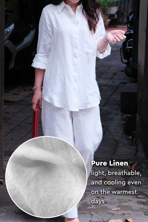 Woman wearing 100% linen natural comfort white two-piece outfit, lightweight and breathable fabric close-up