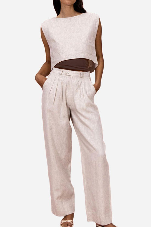 Woman wearing beige cotton-linen blend wide-leg pants and cropped sleeveless top summer outfit