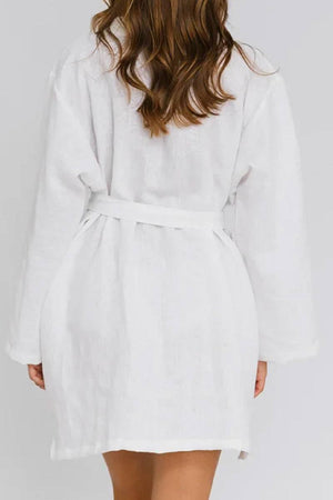 White cotton-linen blend luxury spa robe with belt, breathable and soft fabric, relaxed fit, ideal for comfort and elegance.