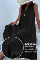 Bohemian tiered midi dress in black with V-neck button detail, soft breathable fabric, and flowing A-line silhouette.