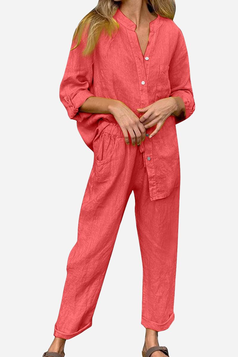 Woman wearing coral casual chic two-piece set with button-up top and relaxed pants