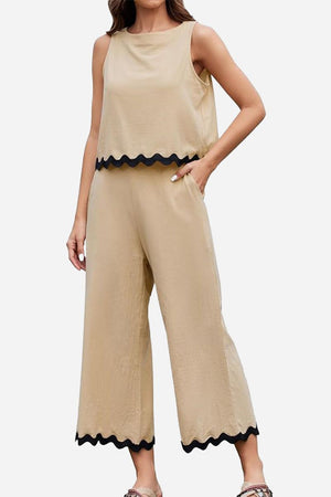 Beige scalloped trim sleeveless top and wide leg pants set with black trim and pockets